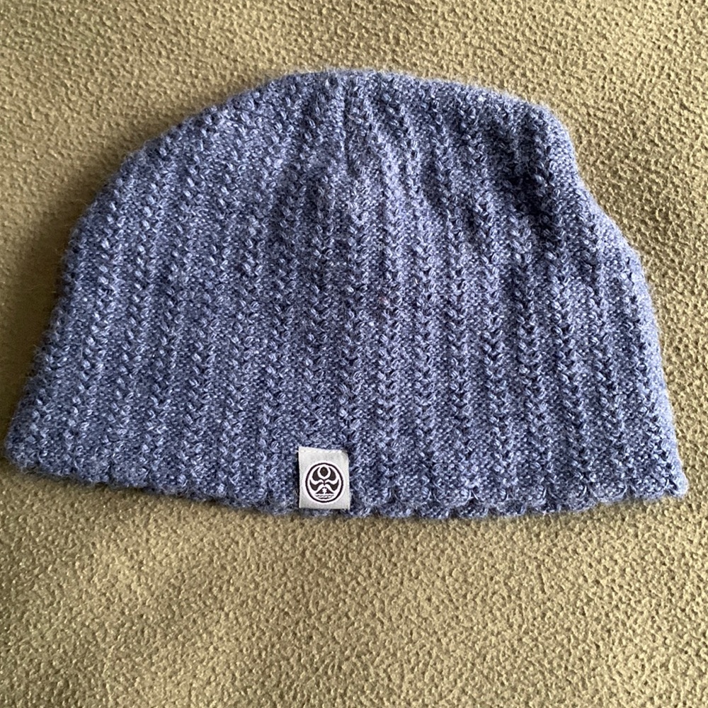 HiC blue knit hat.  Width approximately 10 inches. Depth approximately 7 inches.